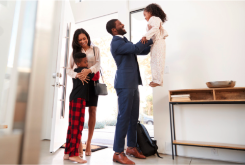 Parents saying goodbye to kids before going to work