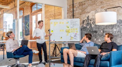 Team around a kanban board