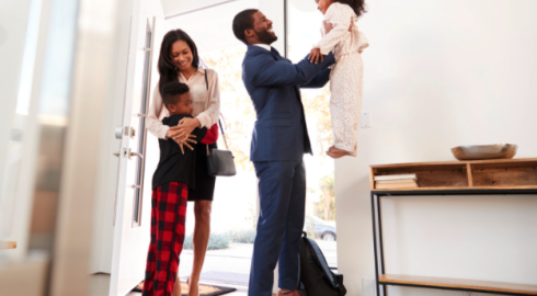 Parents saying goodbye to kids before going to work